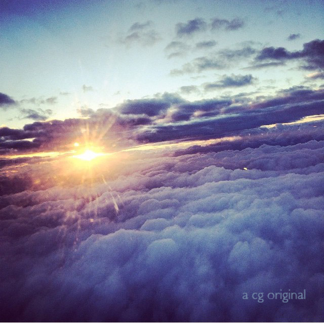 a contented gypsy original photo of a blue and purple sunrise while inflight